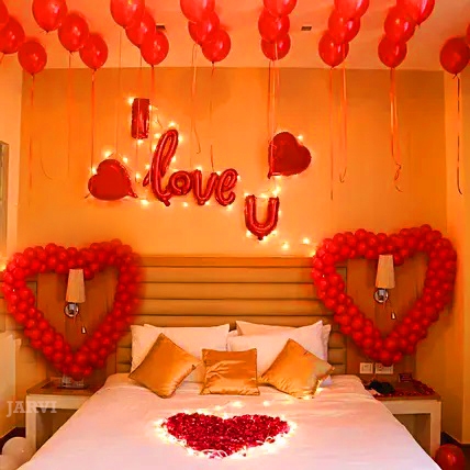 perfect surprise proposal decoration with I love you foil balloon, heart shape medium size foil balloons, red balloons with ribbons on ceiling and led lights